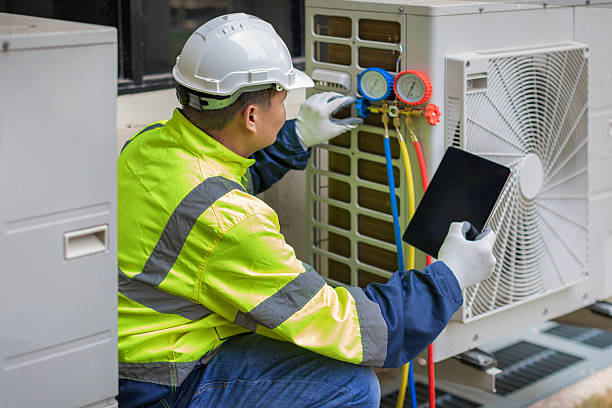 Professional Hvac technician working in Guys, TN